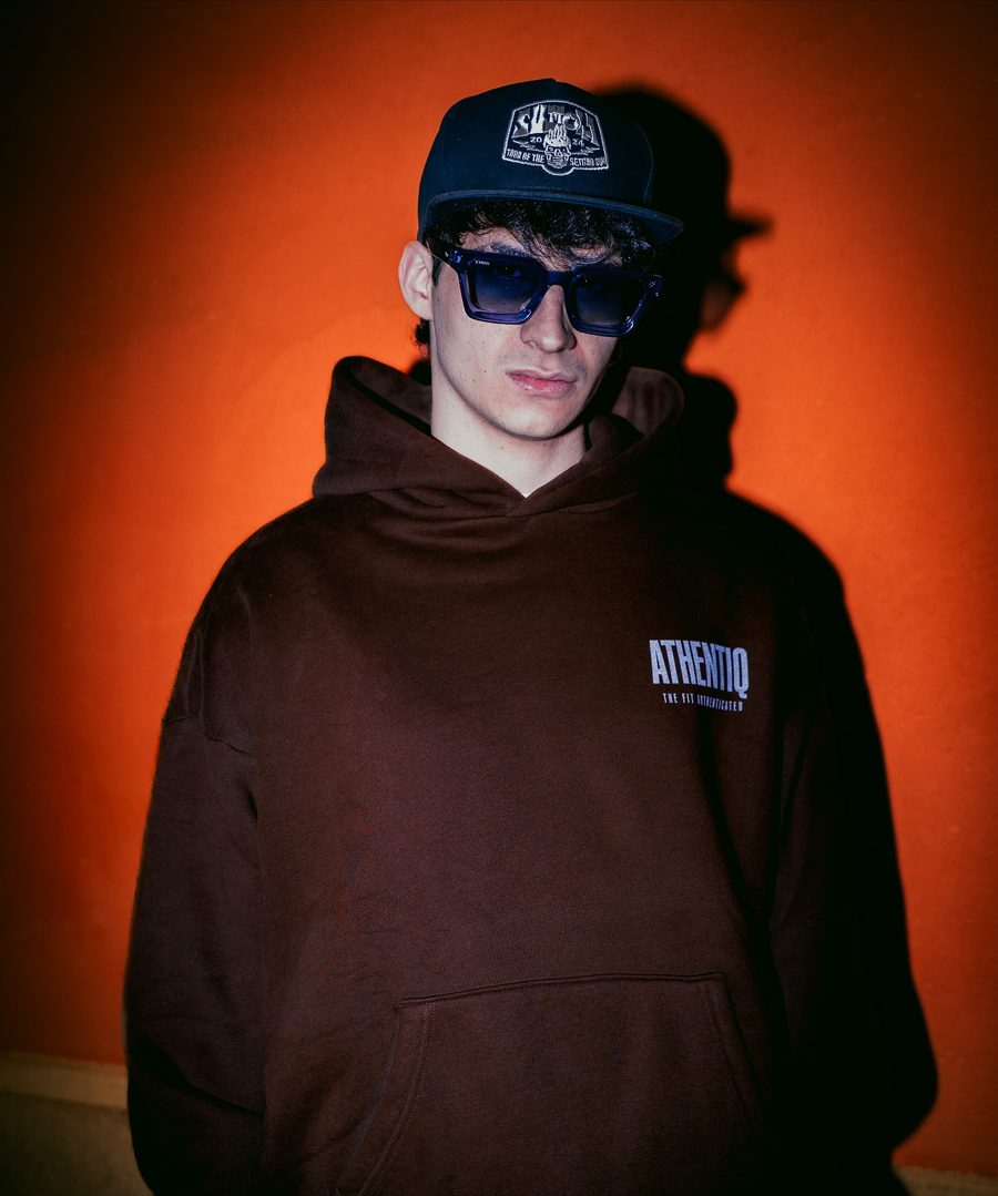 Customer in a brown heavyweight hoodie