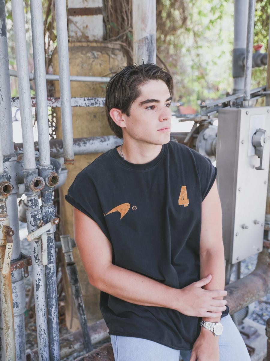 Customer in a black cut-off muscle tee